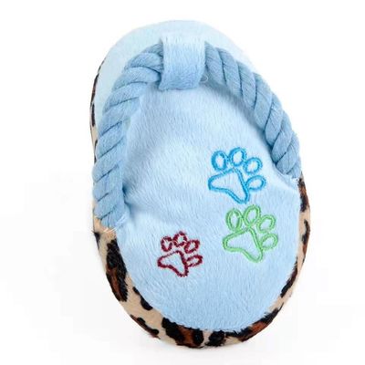 Gli animali domestici che molari del cane la peluche gioca le pantofole vocali della peluche mordono resistente
